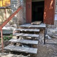 Работы по ремонту крыльца по ул. 1 мая, д. 17